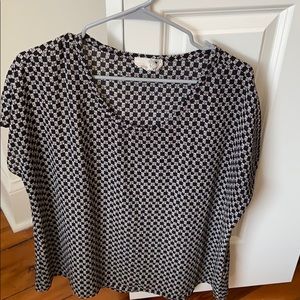 Black and white patterned blouse